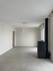 Rénovation salon avec suppression de cloisons et baies vitrées dans une maison à Orgères (35)