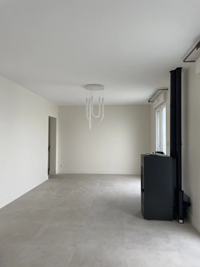 Rénovation salon avec suppression de cloisons et baies vitrées dans une maison à Orgères (35)